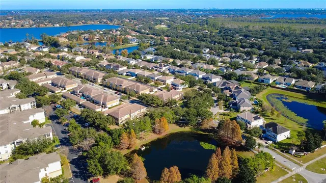 an aerial view of a city with lots of residential buildings