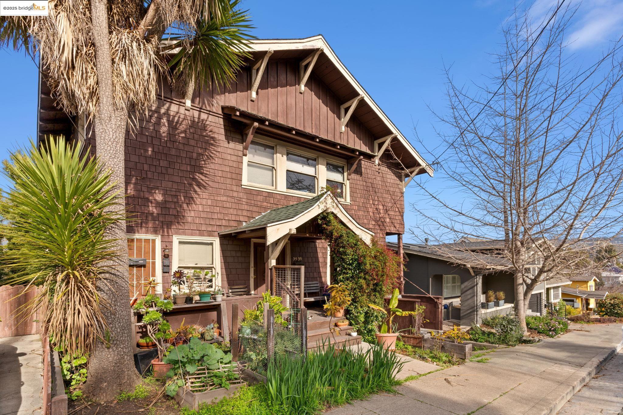 3537 Kempton Way Oakland, CA 94611 - Photo 2 of 17 a front view of a house with a yard