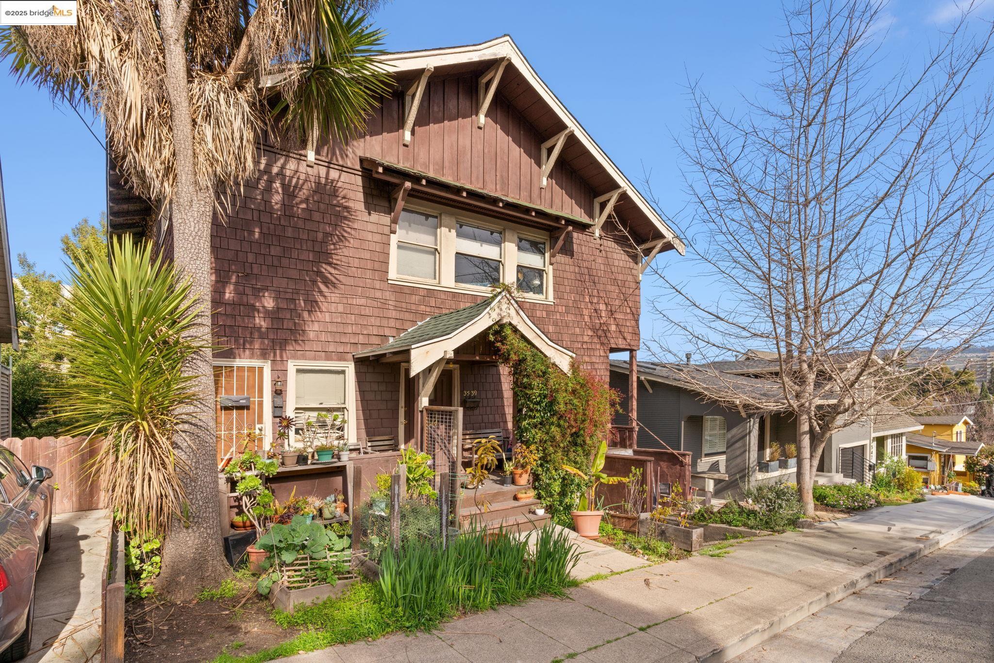 3537 Kempton Way Oakland, CA 94611 - Photo 4 of 17 a front view of a house with garden
