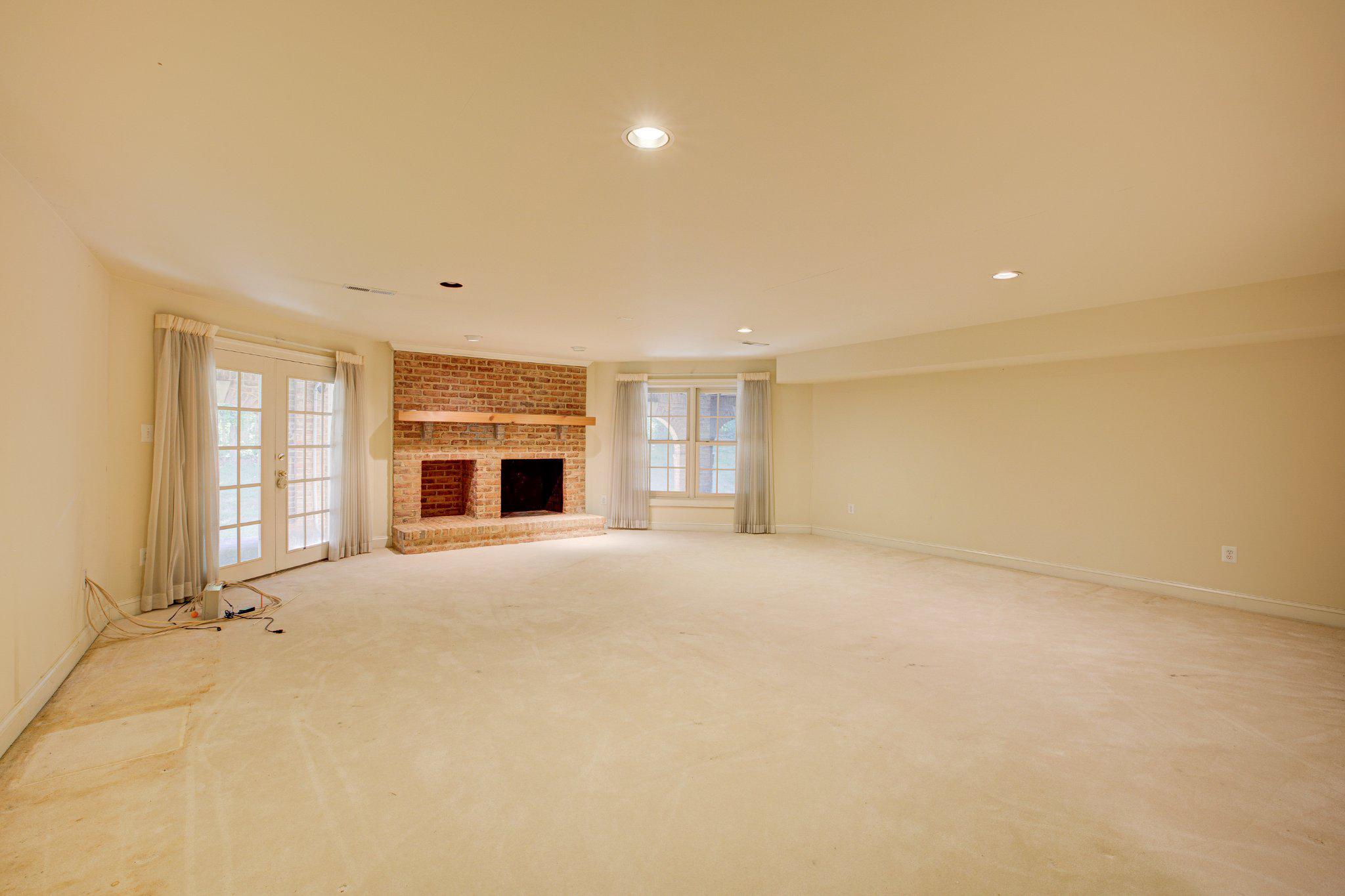 731 Utterback Store Road Great Falls, VA 22066 - Photo 10 of 19 Lower level walk out rec room