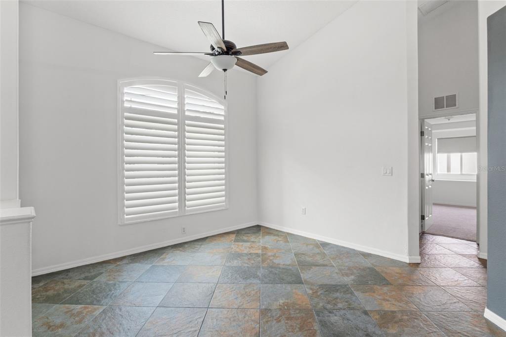 3456 Hanging Moss Loop Spring Hill, FL 34609 - Photo 28 of 81 a view of an empty room with a window