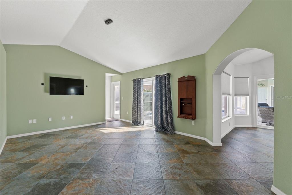 3456 Hanging Moss Loop Spring Hill, FL 34609 - Photo 31 of 81 a view of an empty room with closet and a window