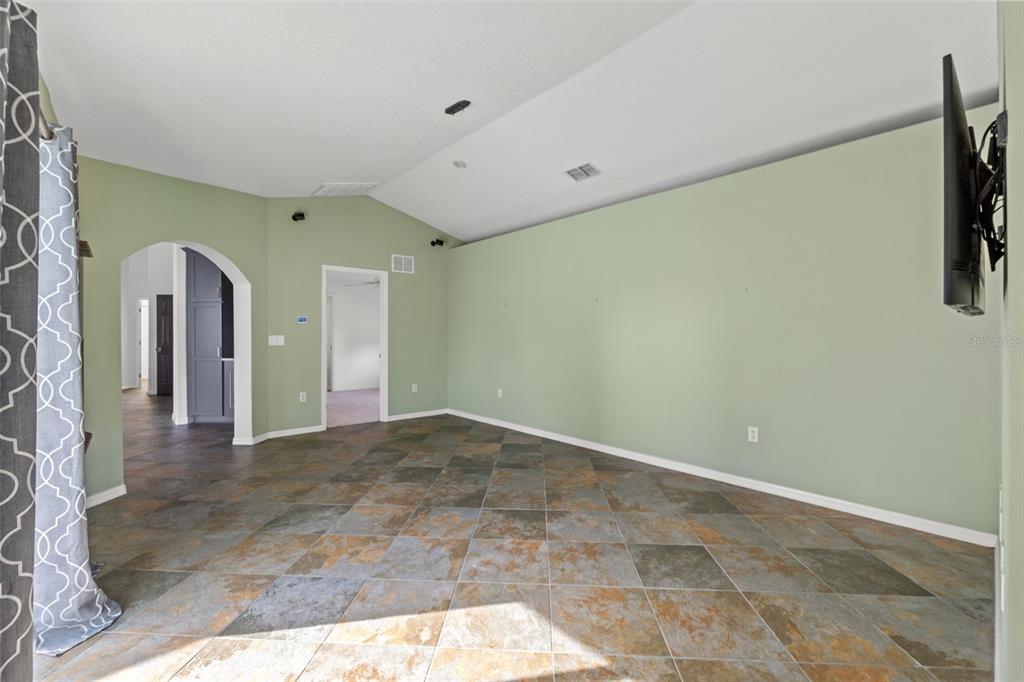 3456 Hanging Moss Loop Spring Hill, FL 34609 - Photo 32 of 81 a view of a big room with closet and windows