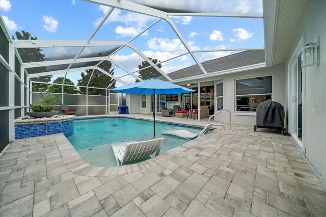 $495,000 | 3456 Hanging Moss Loop, Spring Hill, FL 34609