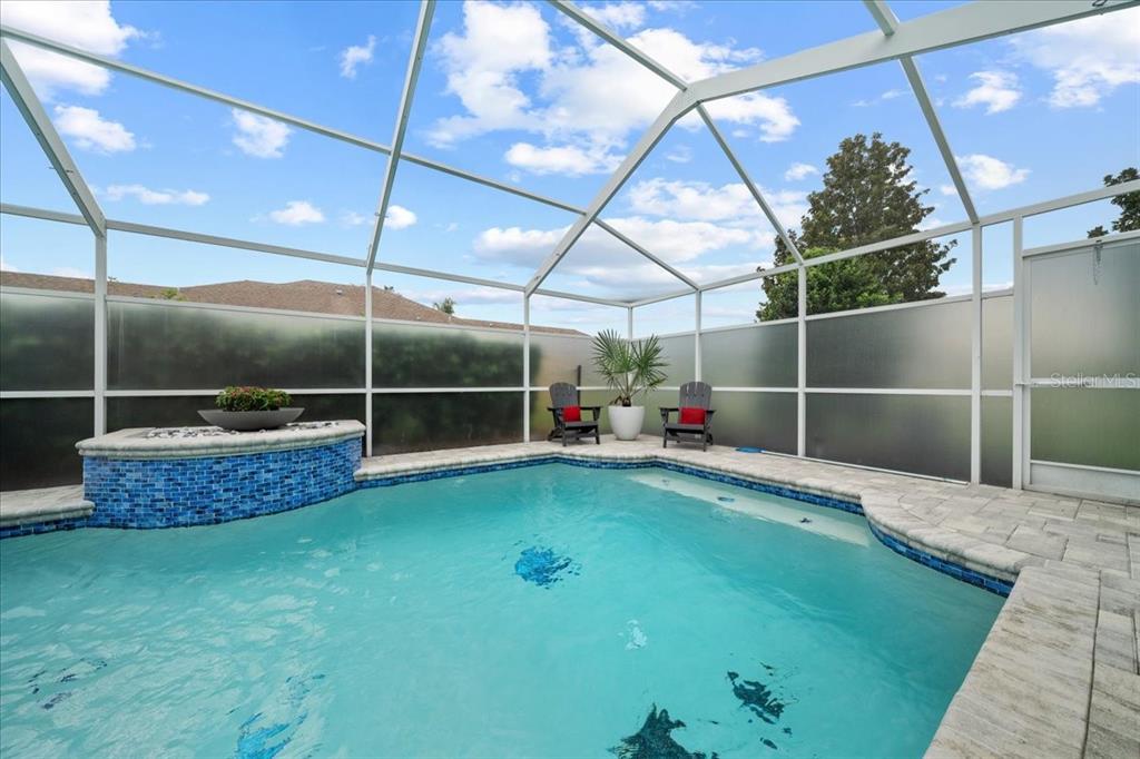 3456 Hanging Moss Loop Spring Hill, FL 34609 - Photo 61 of 81 a view of yard with trampoline