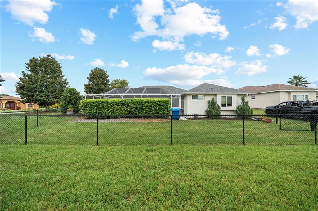 3456 Hanging Moss Loop Spring Hill, FL 34609 - Photo 65 of 81 a view of garden with tall trees