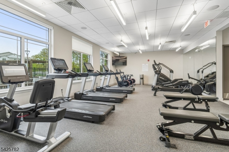 723 Station Road Dunellen, NJ 08812 - Photo 30 of 32 a view of a room with gym equipment