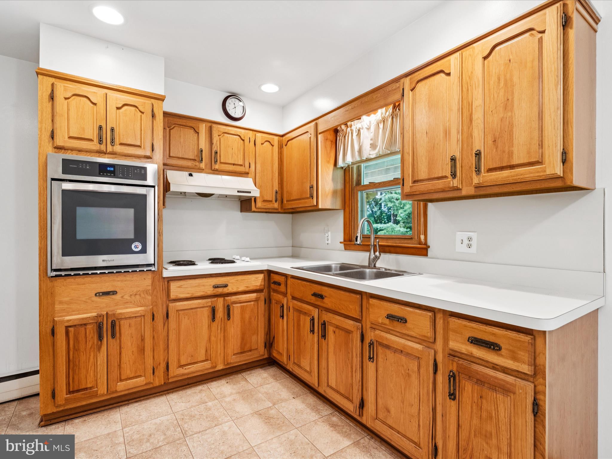 5149 Shookstown Road Frederick, MD 21702 - Photo 13 of 44 a kitchen with stainless steel appliances granite countertop a sink and cabinets