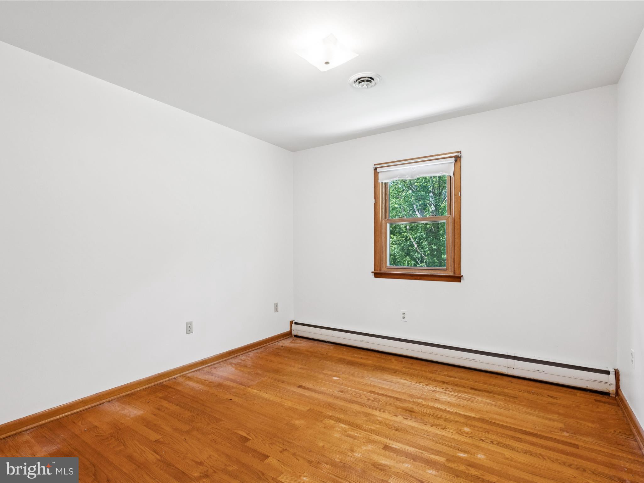 5149 Shookstown Road Frederick, MD 21702 - Photo 21 of 44 an empty room with a window