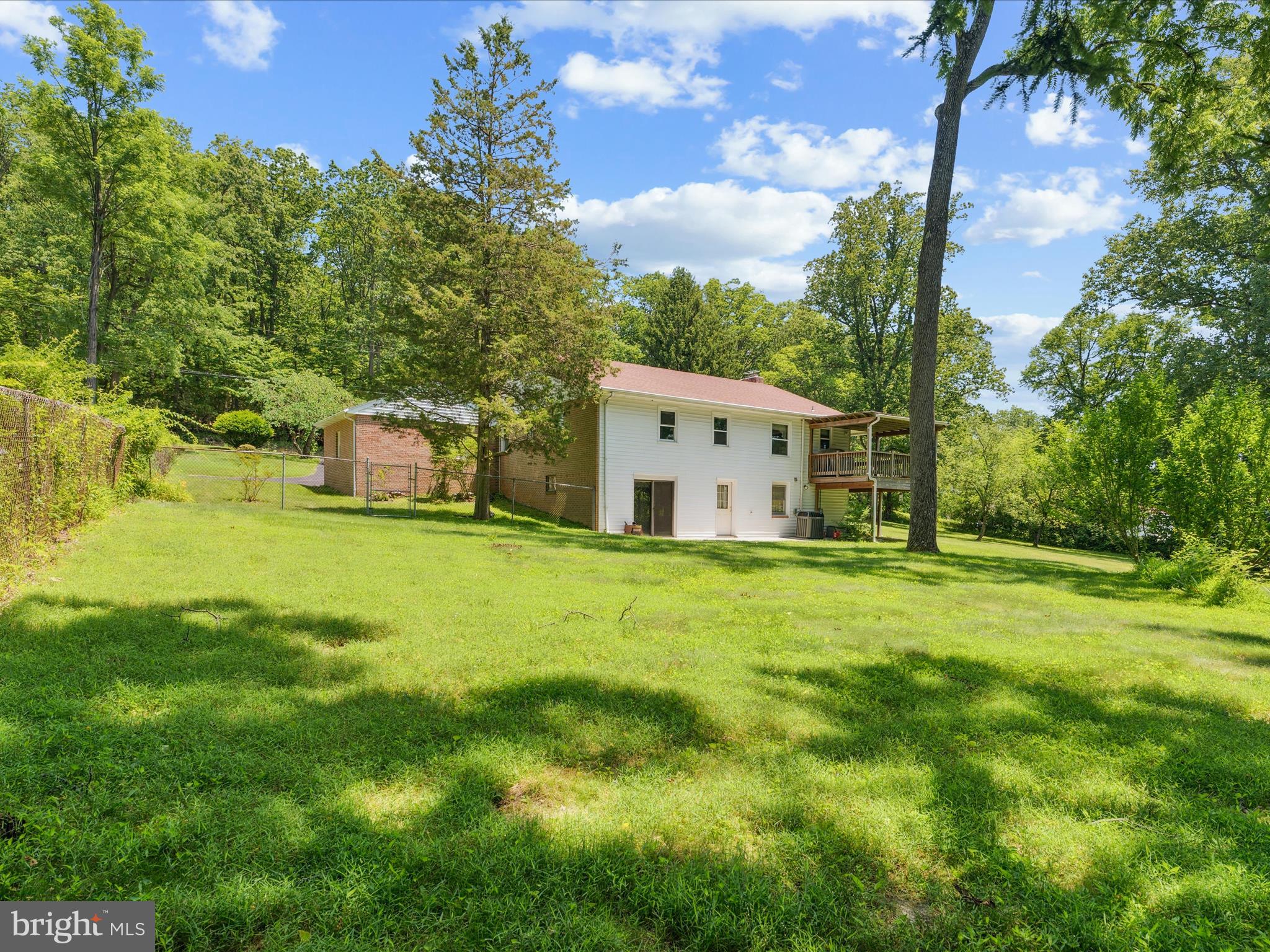 5149 Shookstown Road Frederick, MD 21702 - Photo 41 of 44 a view of a house with a yard