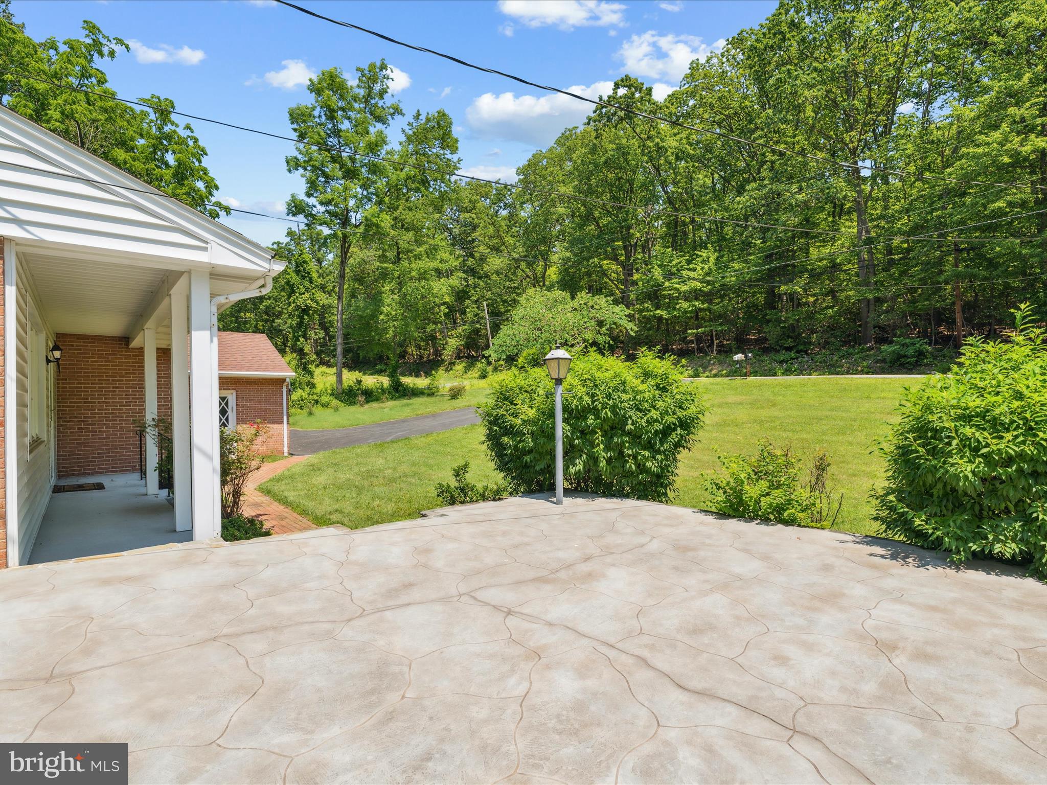 5149 Shookstown Road Frederick, MD 21702 - Photo 7 of 44 a view of a back yard of the house