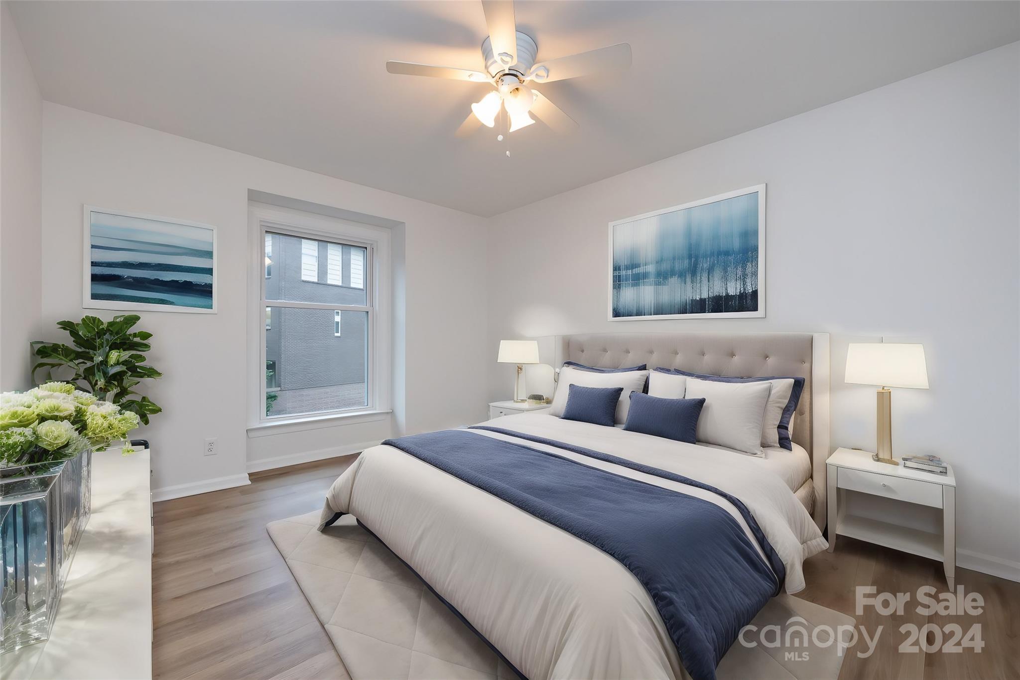 430 Queens Road, Unit 231 Charlotte, NC 28207 - Photo 18 of 23 a bedroom with bed and a window