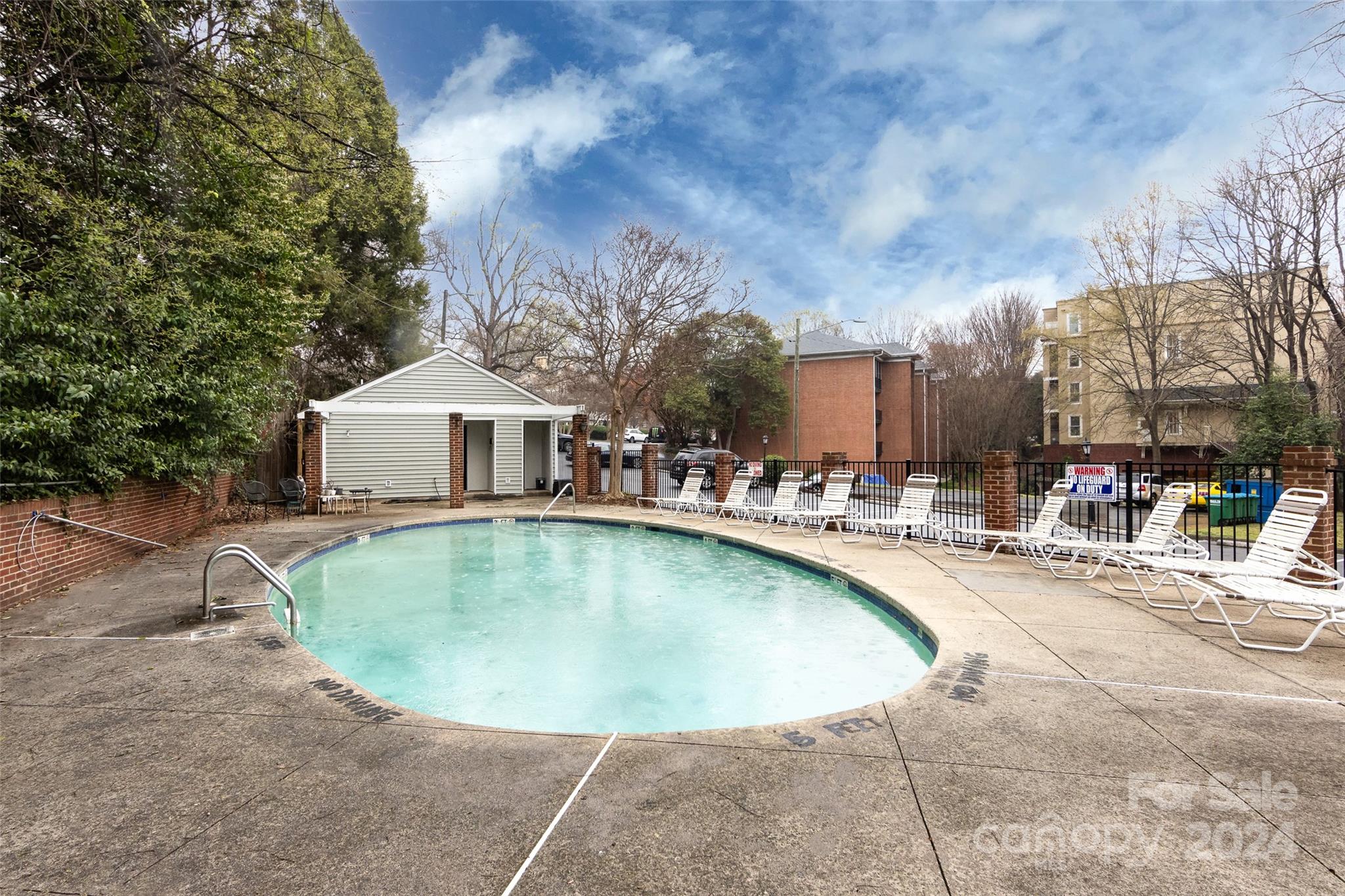 430 Queens Road, Unit 231 Charlotte, NC 28207 - Photo 23 of 23 a view of a swimming pool with outdoor seating