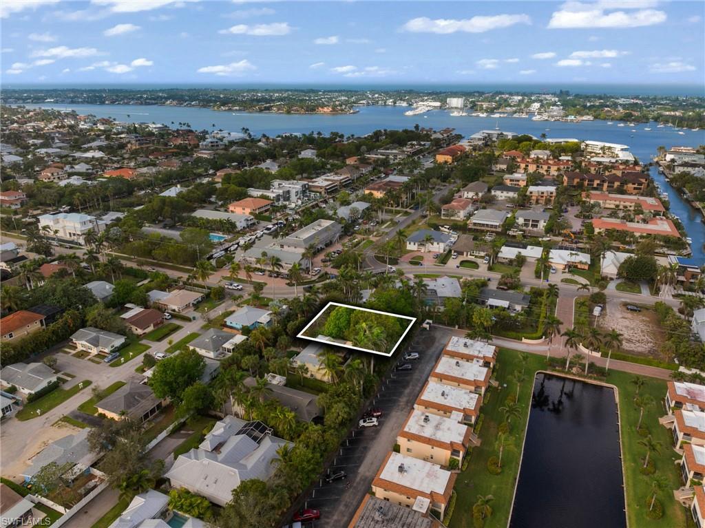 1205 Sandpiper Street Naples, FL 34102 - Photo 7 of 8 an aerial view of a city