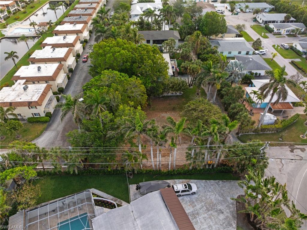 1205 Sandpiper Street Naples, FL 34102 - Photo 8 of 8 an aerial view of a house with garden space and street view