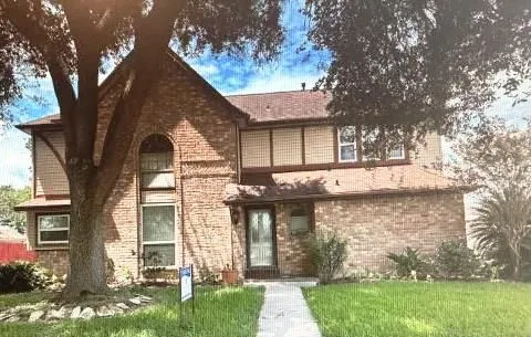 front view of house with a yard