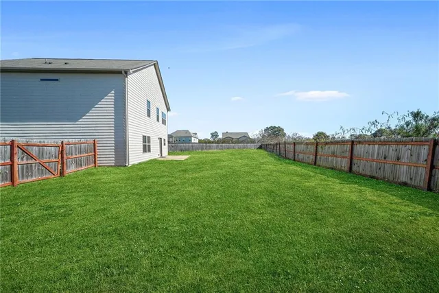 a view of a porch with a yard