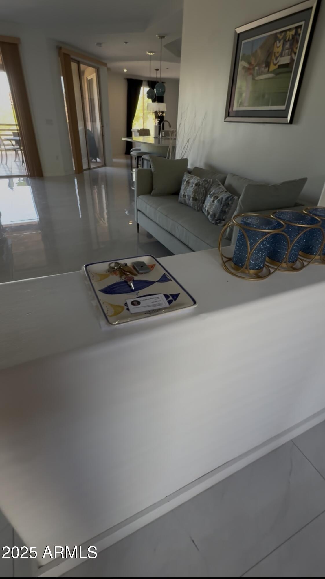 10222 East Southwind Lane, Unit 1009 Scottsdale, AZ 85262 - Photo 13 of 44 a living room with furniture