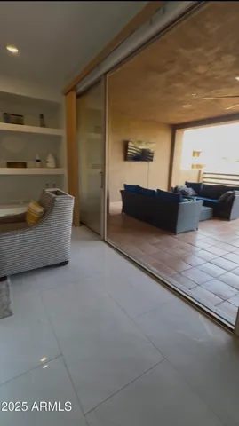 a view of a terrace with chairs