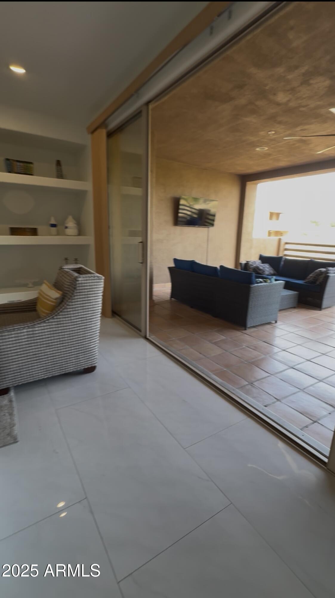 10222 East Southwind Lane, Unit 1009 Scottsdale, AZ 85262 - Photo 17 of 44 a living room with furniture and a couch