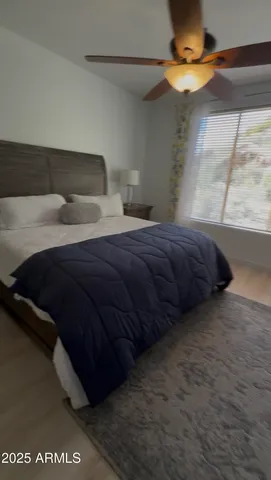 a bathroom with a tub and shower