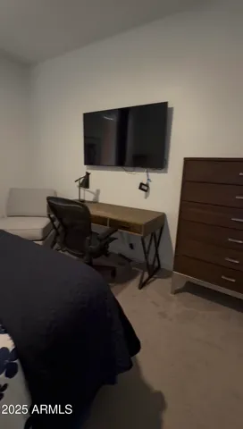 a city street lined with buildings and trees