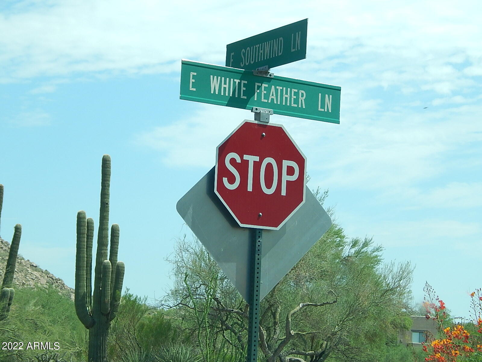 10222 East Southwind Lane, Unit 1009 Scottsdale, AZ 85262 - Photo 34 of 44 a sign broad on the side of a building
