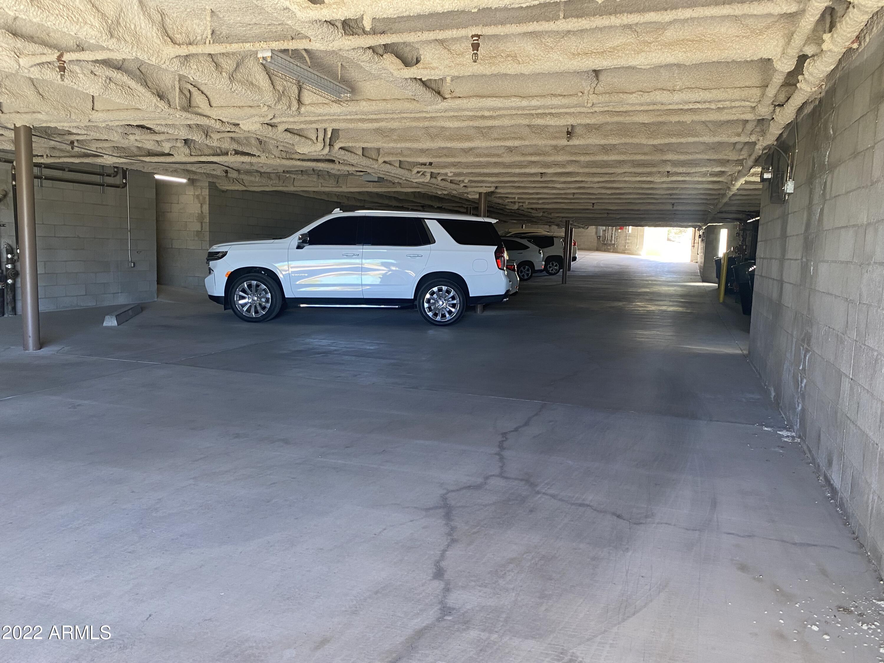 10222 East Southwind Lane, Unit 1009 Scottsdale, AZ 85262 - Photo 37 of 44 a car parked in parking space