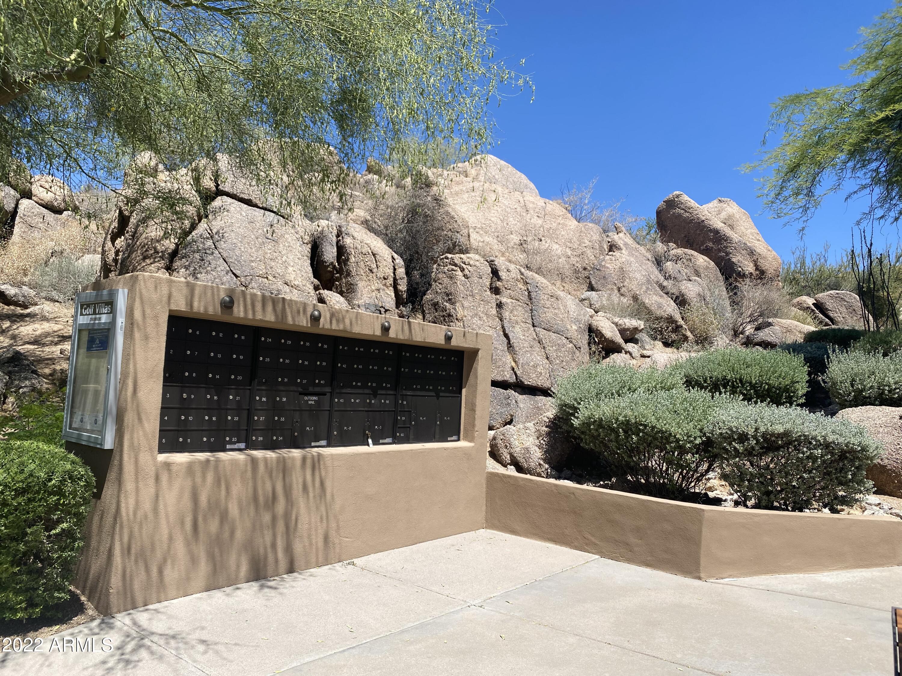 10222 East Southwind Lane, Unit 1009 Scottsdale, AZ 85262 - Photo 40 of 44 a view of a back yard of the house