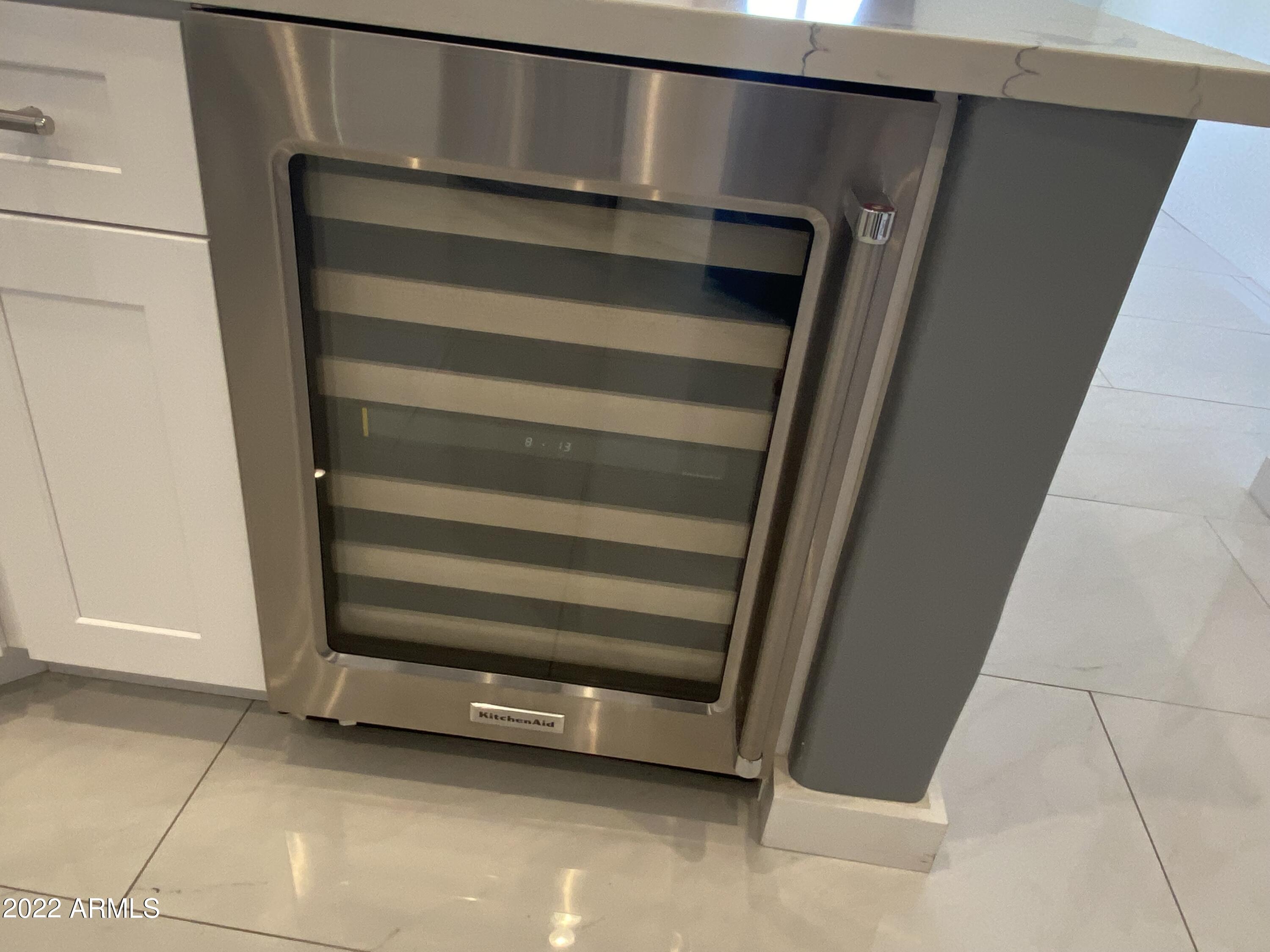 10222 East Southwind Lane, Unit 1009 Scottsdale, AZ 85262 - Photo 5 of 44 a view of walk in closet with empty racks