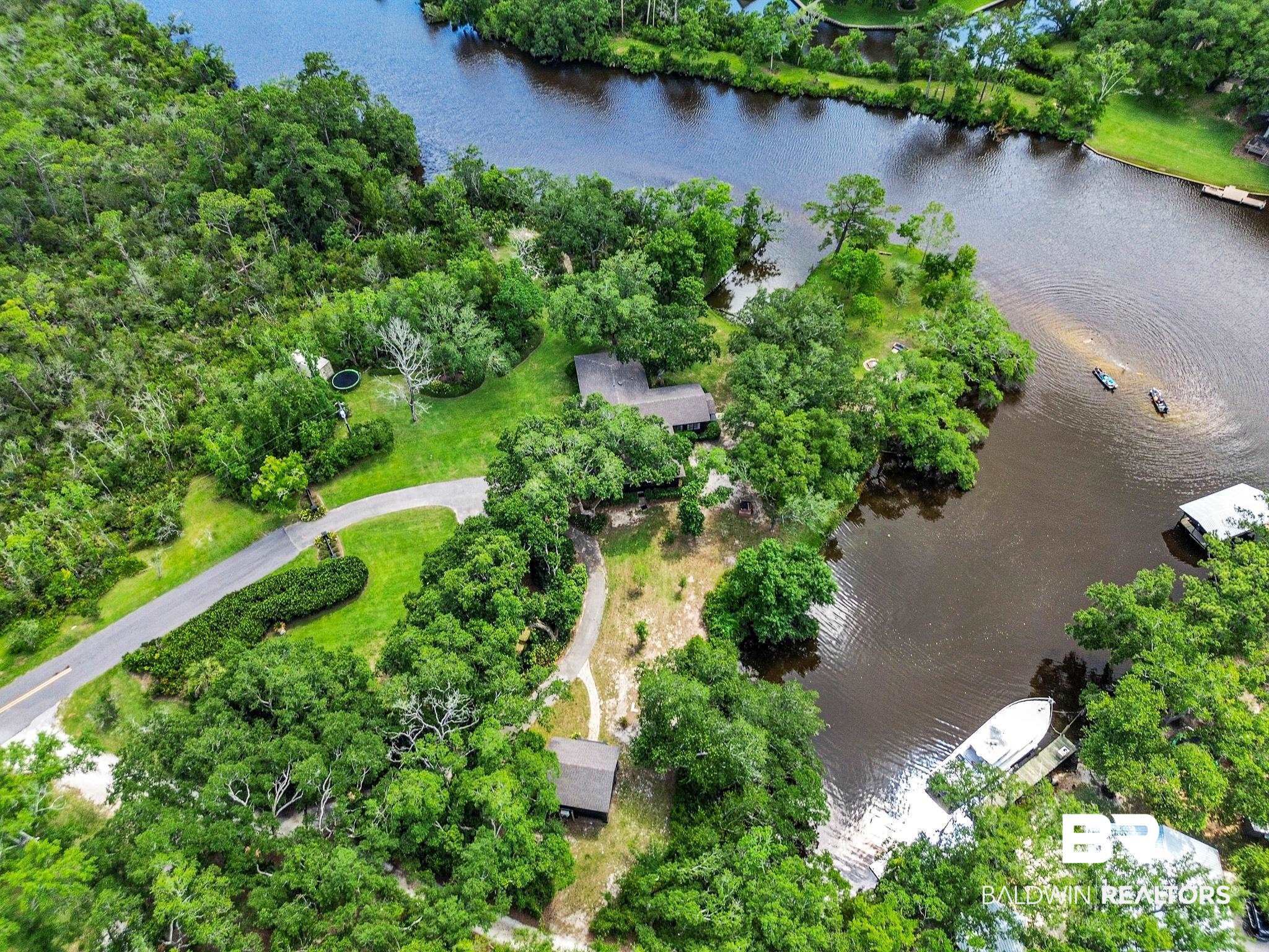 18513 Yacht Club Road Foley, AL 36535 - Photo 48 of 53 Drone / aerial view with a water view