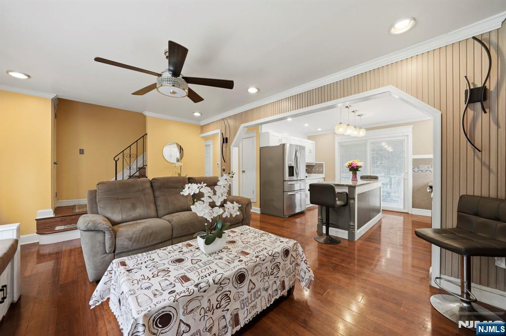52 Barbara Drive Pompton Lakes, NJ 07442 - Photo 6 of 30 a living room with furniture kitchen view and a wooden floor