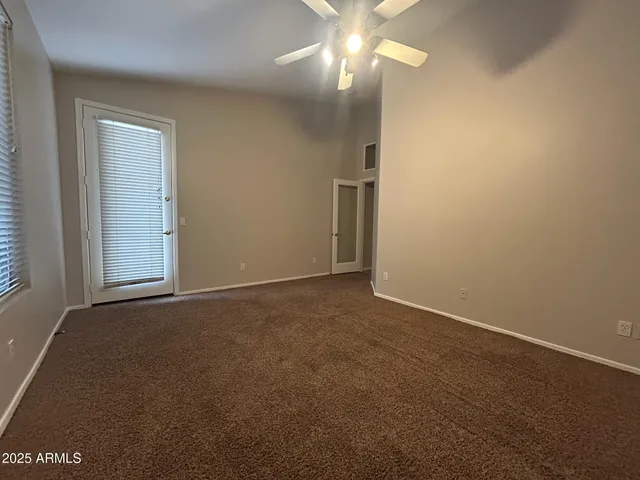 an empty room with a empty space and a window