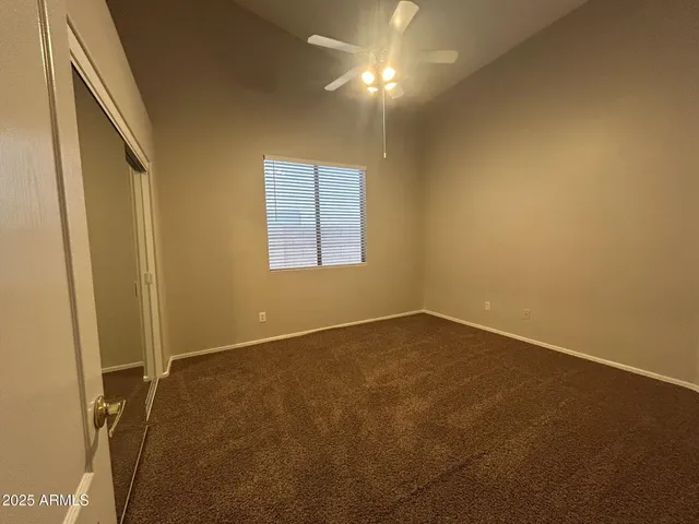 an empty room with a empty space and a window