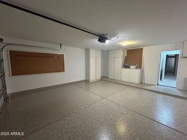 a view of an empty room with a fireplace