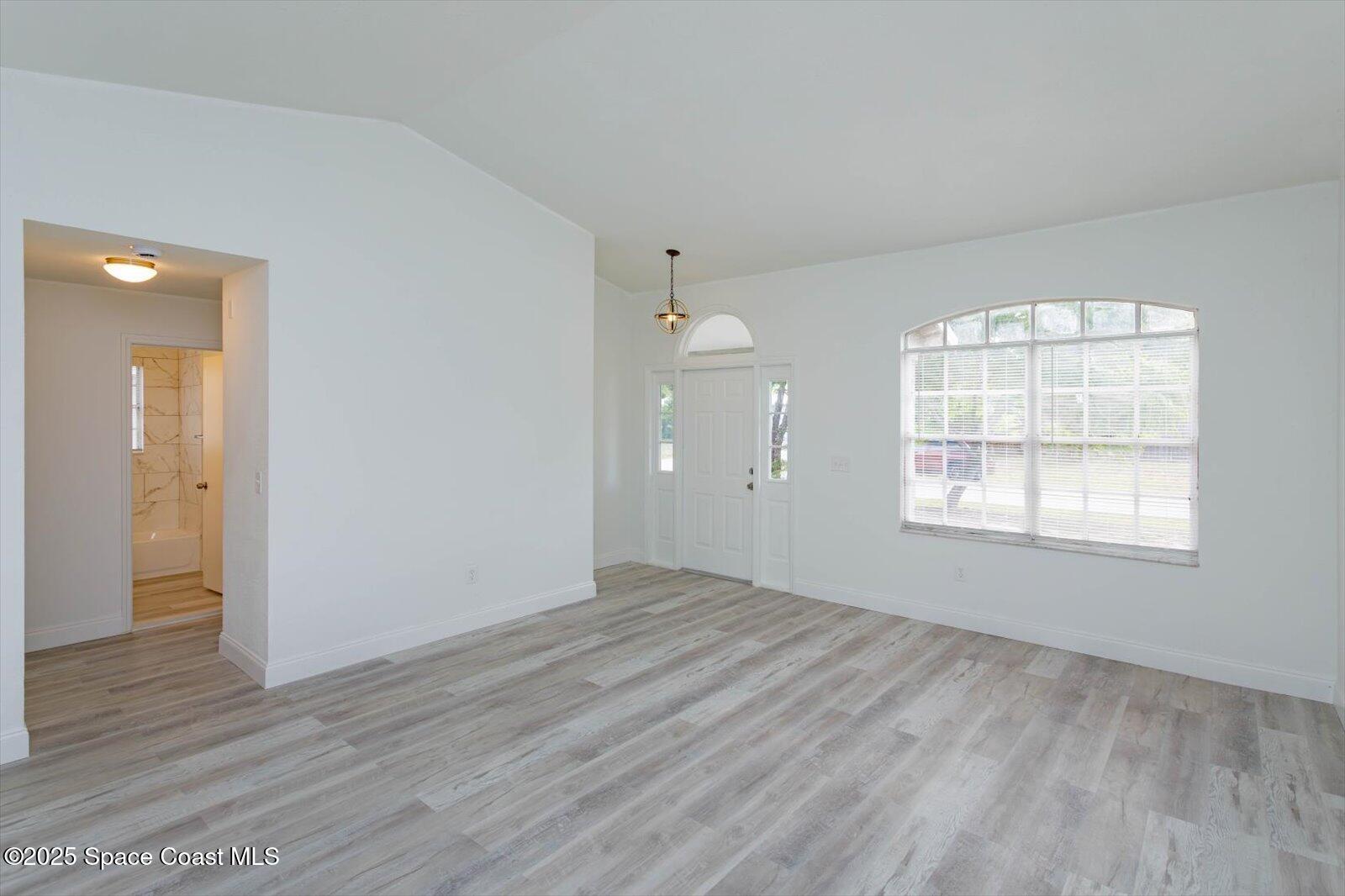 434 Tunis Road Southwest Palm Bay, FL 32908 - Photo 3 of 21 03-Living Room