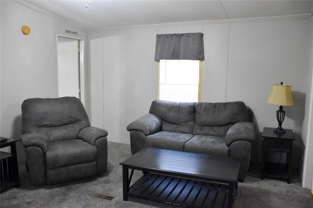 13396 Highway 53 Fairmount, GA 30139 - Photo 11 of 20 a living room with furniture and a window