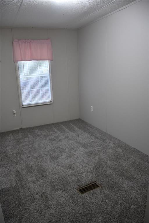 13396 Highway 53 Fairmount, GA 30139 - Photo 7 of 20 an empty room with a window