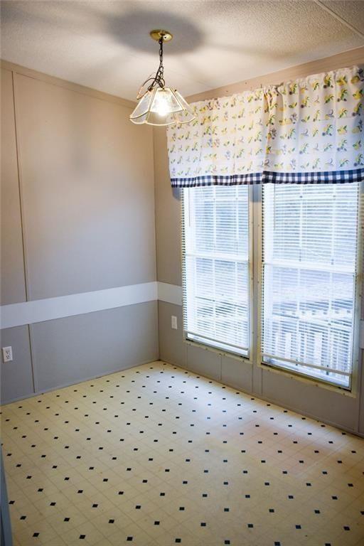 13396 Highway 53 Fairmount, GA 30139 - Photo 9 of 20 a bedroom with a bed and a window