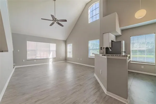 a view of a kitchen with a sink dishwasher and a window