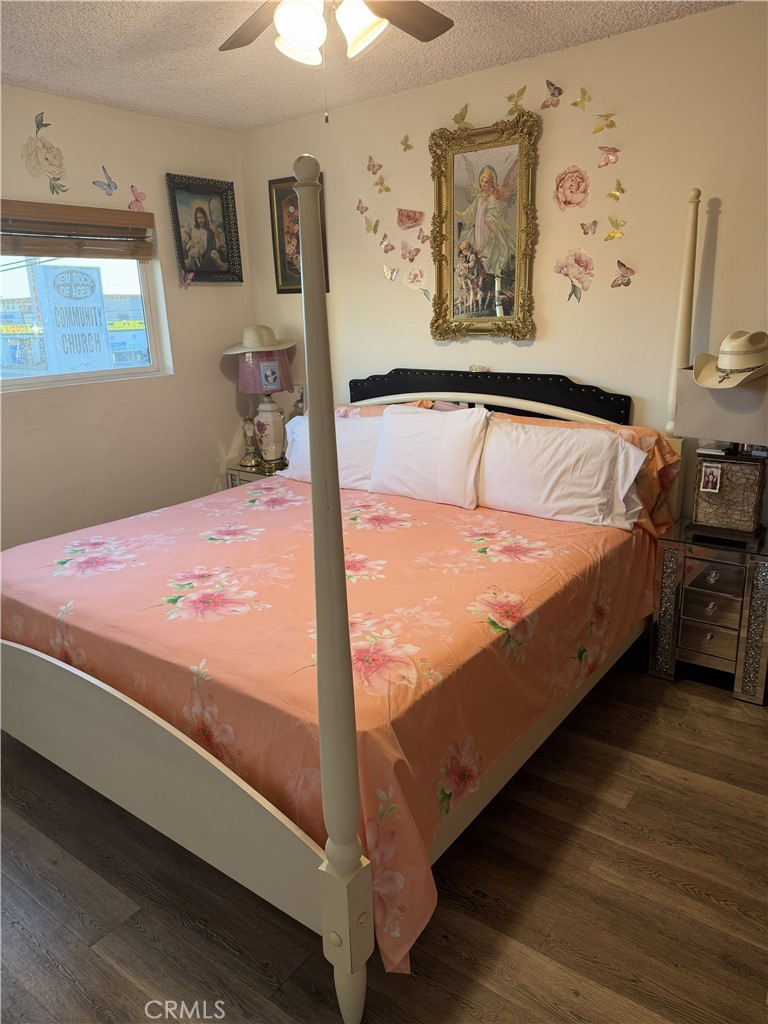 12940 Prairie Avenue Hawthorne, CA 90250 - Photo 11 of 17 a bed sitting in a bedroom next to a window