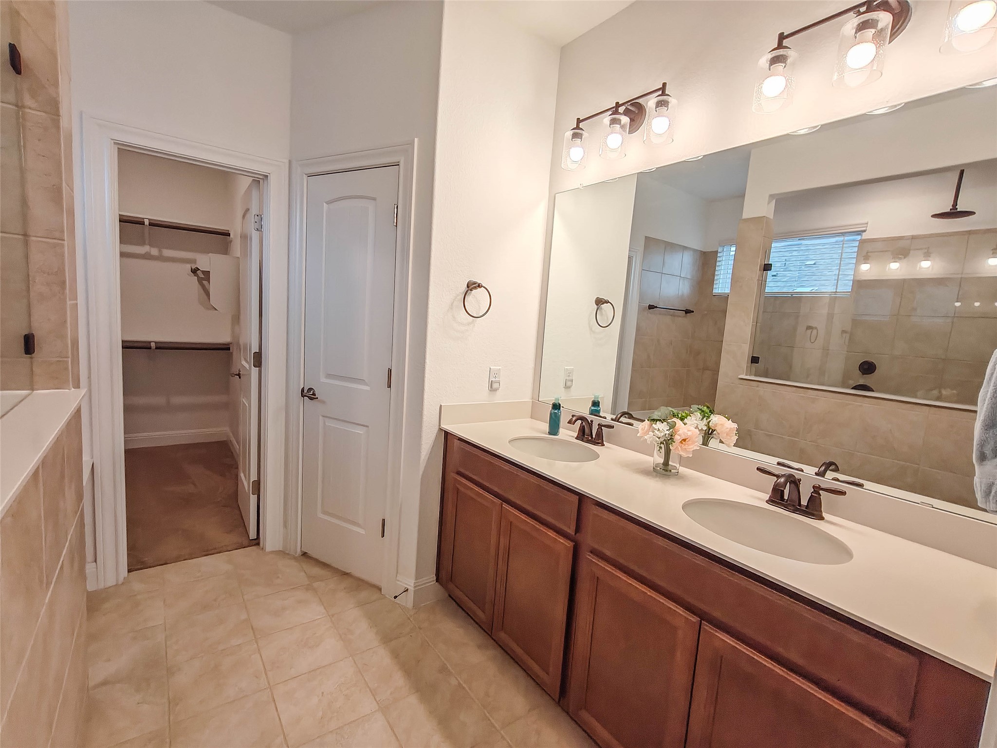 200 Fiddleneck Road Marble Falls, TX 78654 - Photo 14 of 37 a bathroom with a sink double vanity and a mirror