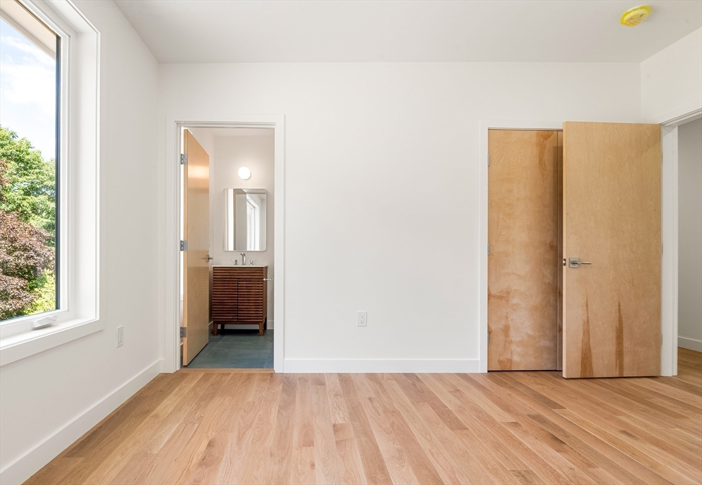 23 Deerhaven Road Lincoln, MA 01773 - Photo 30 of 39 a view of livingroom with hardwood floor and hallway