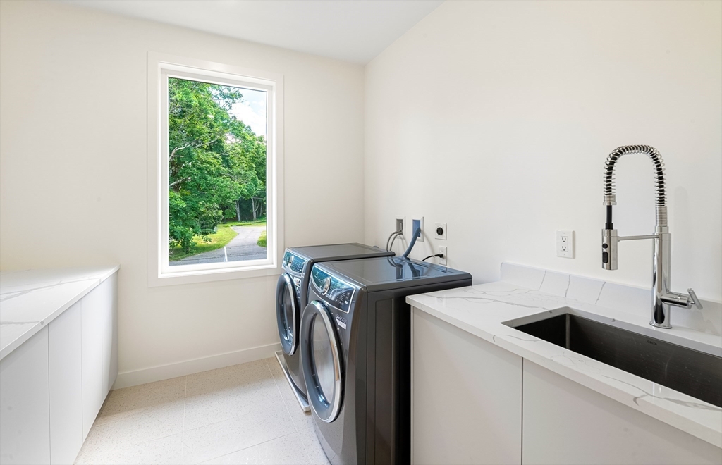 23 Deerhaven Road Lincoln, MA 01773 - Photo 34 of 39 a utility room with sink dryer and washer