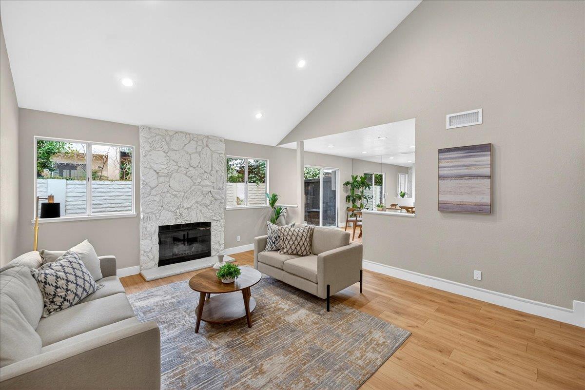 244 Rachael Place Pleasanton, CA 94566 - Photo 4 of 24 a living room with furniture and a fireplace