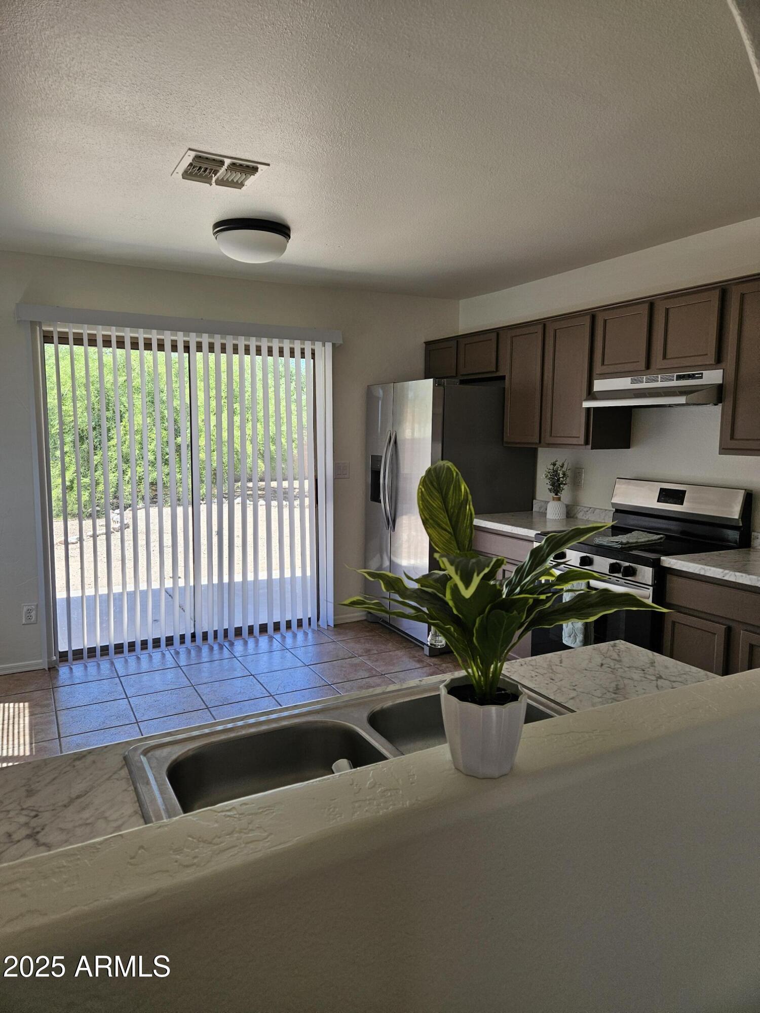 720 South Del Rio Court Apache Junction, AZ 85119 - Photo 8 of 26 20250830_131326