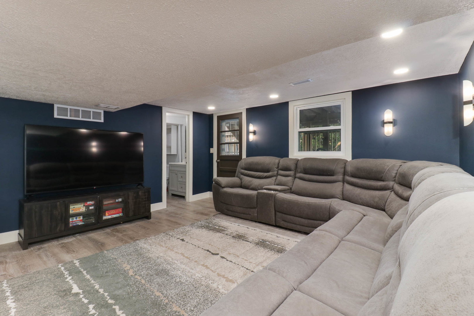 1222 Jersey Avenue Normal, IL 61761 - Photo 12 of 41 a living room with furniture and a flat screen tv