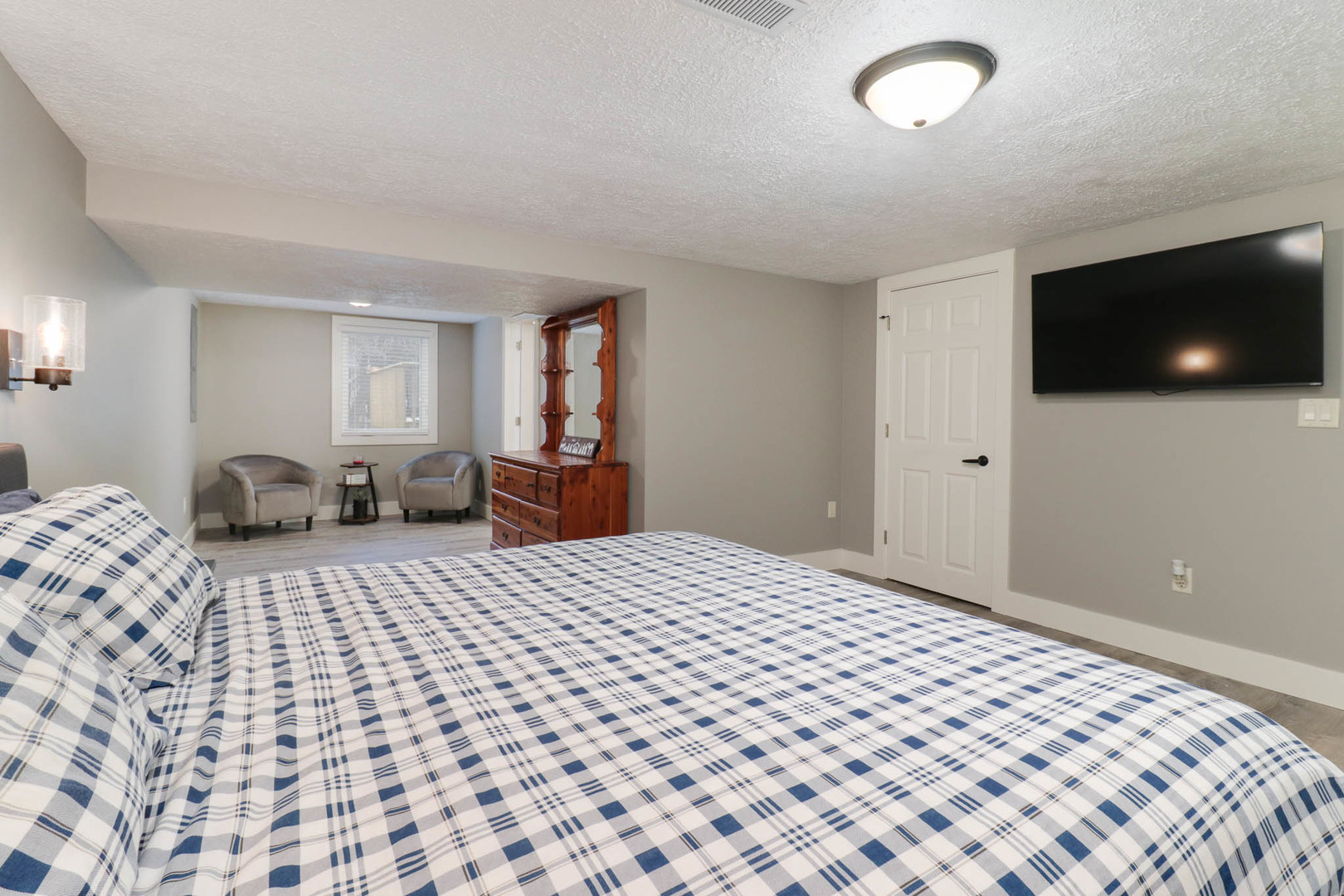 1222 Jersey Avenue Normal, IL 61761 - Photo 14 of 41 a bedroom with a bed and a flat screen tv