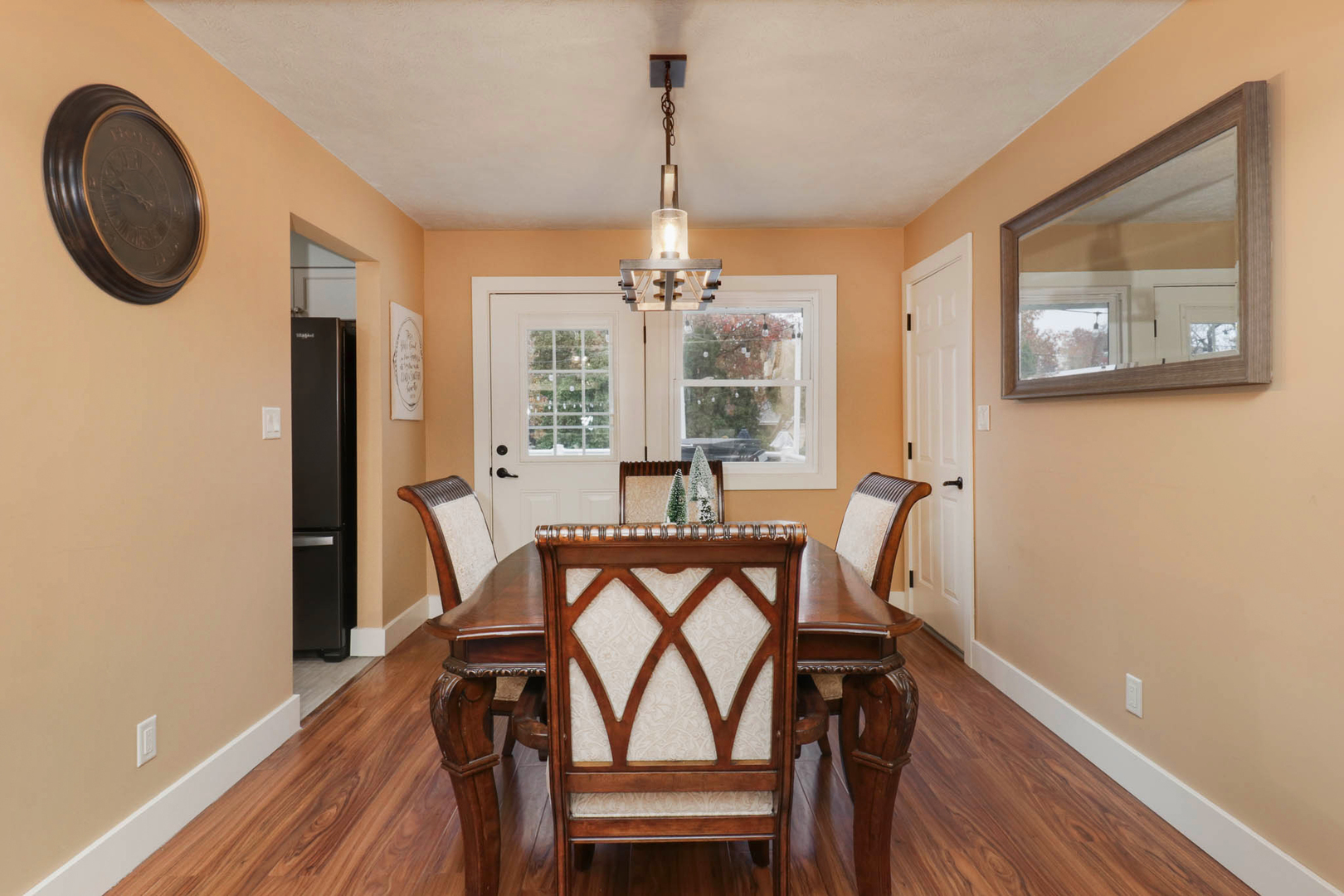 1222 Jersey Avenue Normal, IL 61761 - Photo 21 of 41 a view of a dining room with furniture window and wooden floor