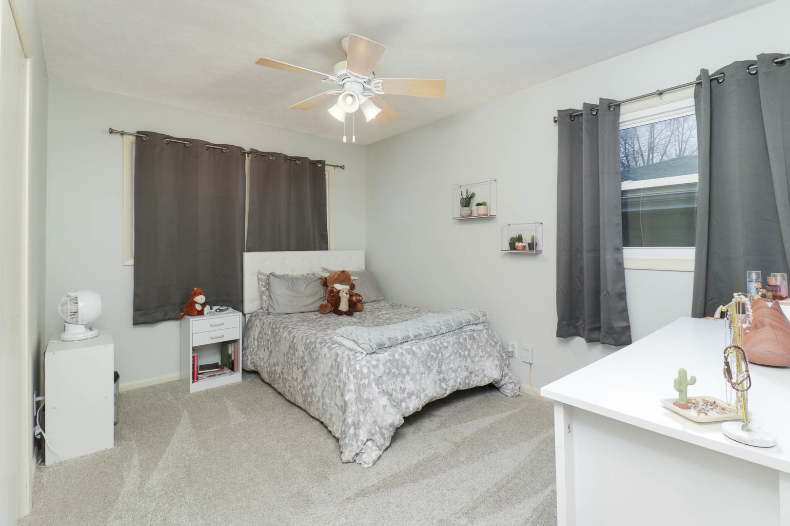 1222 Jersey Avenue Normal, IL 61761 - Photo 25 of 41 a bedroom with a bed and a chandelier